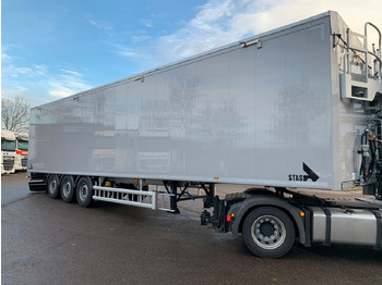 Su slankiojanciomis grindimis puspriekabė STAS