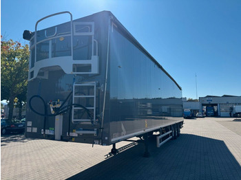 Su slankiojanciomis grindimis puspriekabė STAS