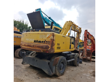 Ratinis ekskavatorius KOMATSU PW150: foto 3