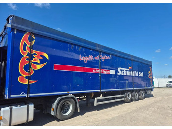 Su slankiojanciomis grindimis puspriekabė STAS