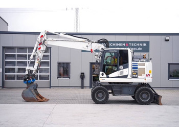 Ratinis ekskavatorius KOMATSU PW148-11