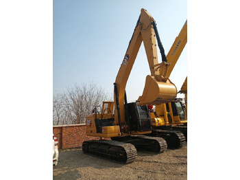 Vikšrinis ekskavatorius CAT 323GC: foto 3