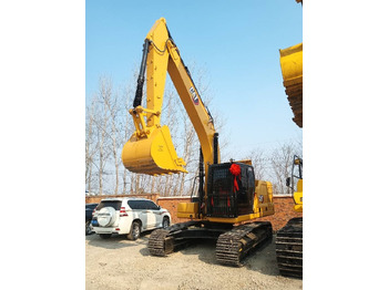 Vikšrinis ekskavatorius CAT 323GC: foto 2