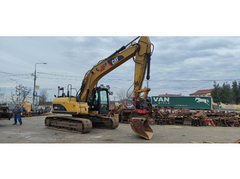 Vikšrinis ekskavatorius CAT 320 D: foto 2