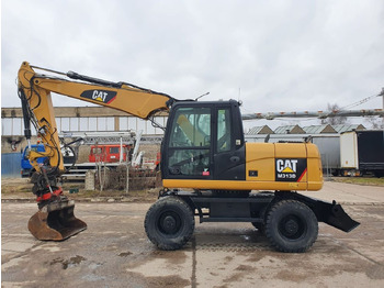 Ratinis ekskavatorius CATERPILLAR M313D