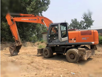Ratinis ekskavatorius HITACHI ZX210W