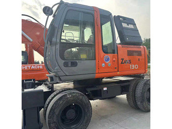 Ratinis ekskavatorius HITACHI ZX130W