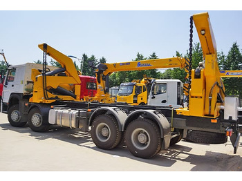 Konteineris-vežimus/ Sukeisti kūną sunkvežimis