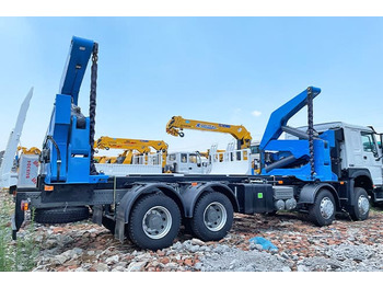 Konteineris-vežimus/ Sukeisti kūną sunkvežimis