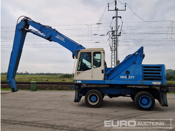 Ratinis ekskavatorius Fuchs MHL331: foto 2