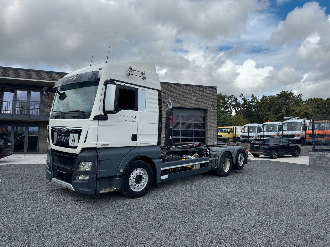 MAN TGX 26.520 D38 Abrollkipper Multilift - Hook-lift sunkvežimis: foto 2 MAN TGX 26.520 D38 Abrollkipper Multilift - Hook-lift sunkvežimis: foto 2