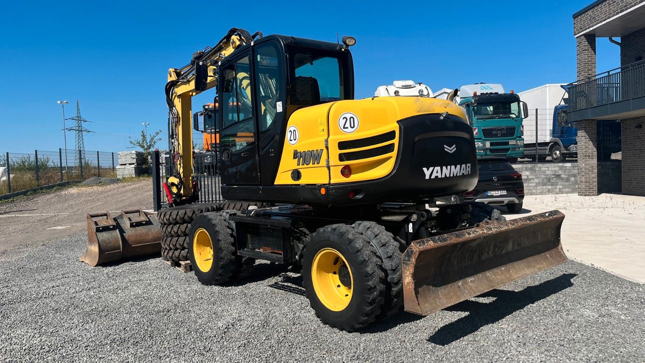 Yanmar B110W Mobilbagger Rotortilt Klima 4x Löffel - Ratinis ekskavatorius: foto 5 Yanmar B110W Mobilbagger Rotortilt Klima 4x Löffel - Ratinis ekskavatorius: foto 5