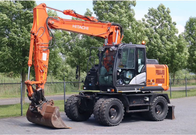 Hitachi ZX 140 W-5B | TILT QC | BUCKET | DOZER BLADE | DUTCH REG. - Ratinis ekskavatorius: foto 2 Hitachi ZX 140 W-5B | TILT QC | BUCKET | DOZER BLADE | DUTCH REG. - Ratinis ekskavatorius: foto 2