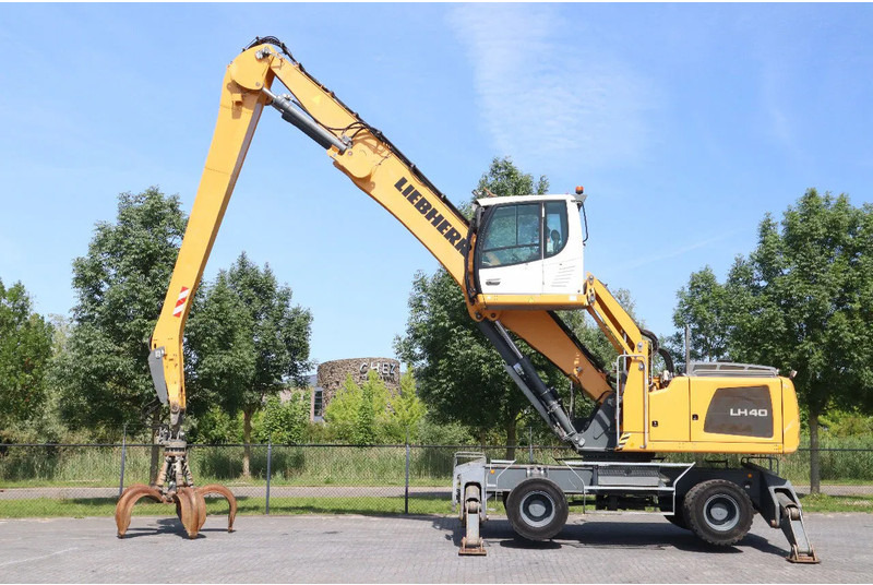 Liebherr LH 40 M LITRONIC | GRAB | QUICK COUPLER | 16 METER - Ratinis ekskavatorius: foto 1 Liebherr LH 40 M LITRONIC | GRAB | QUICK COUPLER | 16 METER - Ratinis ekskavatorius: foto 1