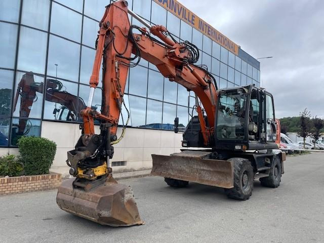Hitachi ZX140W-5B - Ratinis ekskavatorius: foto 1 Hitachi ZX140W-5B - Ratinis ekskavatorius: foto 1