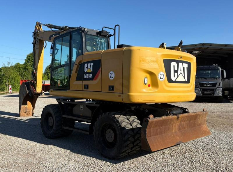 Caterpillar M318F - Ratinis ekskavatorius: foto 1 Caterpillar M318F - Ratinis ekskavatorius: foto 1