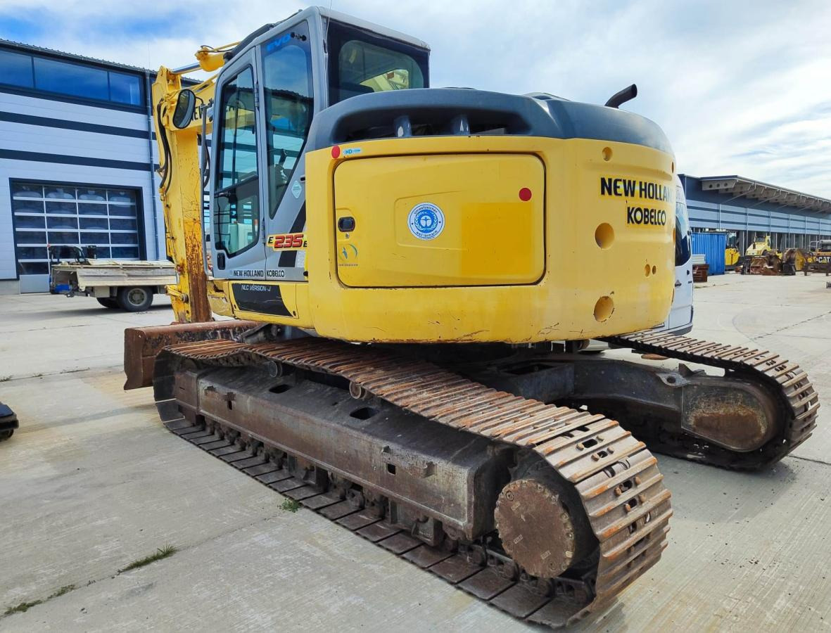 New Holland E235B SR-2 - Vikšrinis ekskavatorius: foto 1 New Holland E235B SR-2 - Vikšrinis ekskavatorius: foto 1