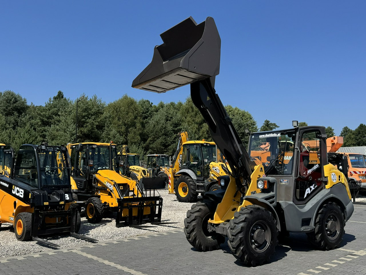 Mecalac AX 700 Szybko-Złącze Łyżka Super Stan - Ratinis krautuvas: foto 1 Mecalac AX 700 Szybko-Złącze Łyżka Super Stan - Ratinis krautuvas: foto 1