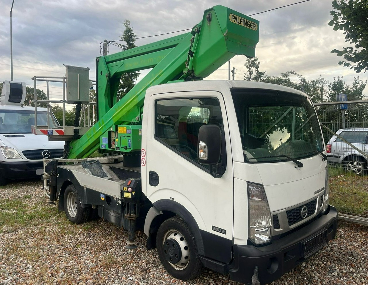 Nissan Cabstar Zwyżka Podmośnik Koszowy PALFINGER P240 AXE UDT - Autobokštelio: foto 1 Nissan Cabstar Zwyżka Podmośnik Koszowy PALFINGER P240 AXE UDT - Autobokštelio: foto 1