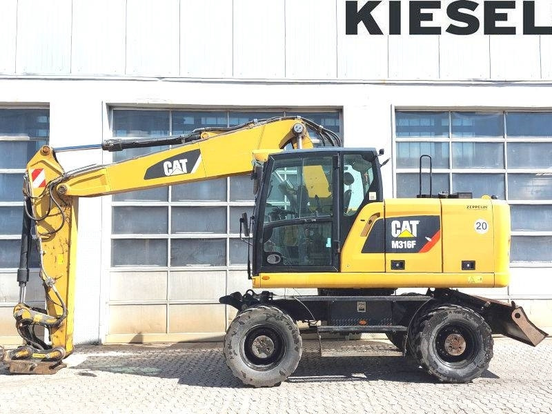 CAT M 316 F - Ratinis ekskavatorius: foto 1 CAT M 316 F - Ratinis ekskavatorius: foto 1