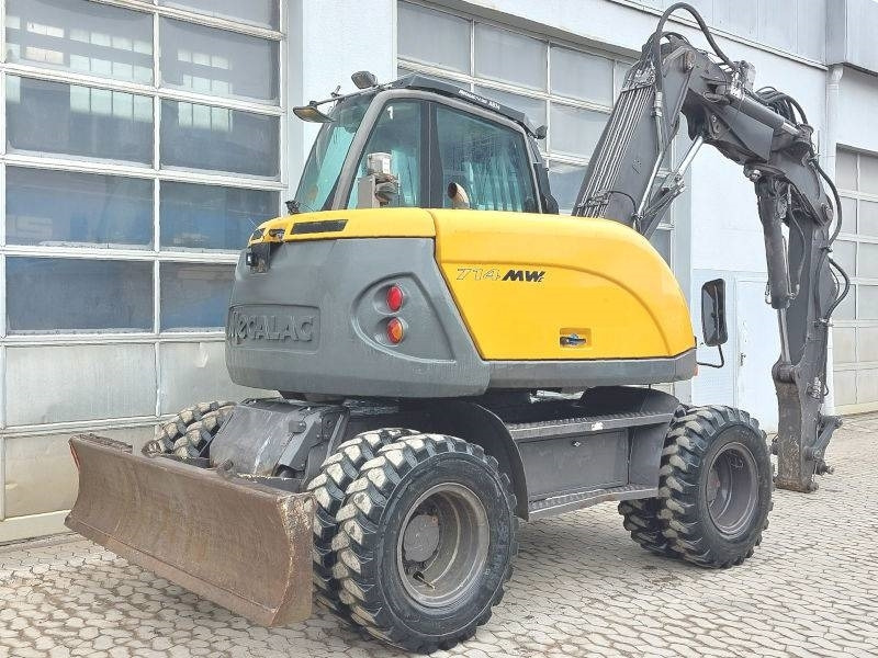 Ratinis ekskavatorius Mecalac 714 MW: foto 6
