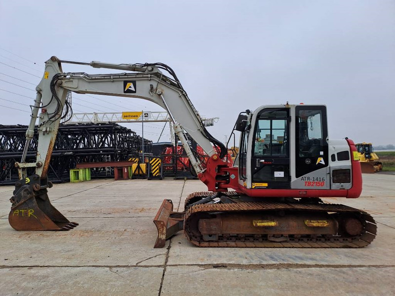 Takeuchi TB 2150 - Vikšrinis ekskavatorius: foto 1 Takeuchi TB 2150 - Vikšrinis ekskavatorius: foto 1
