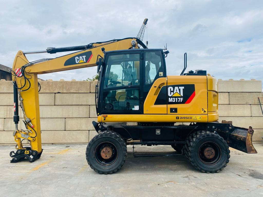 CAT m317f - Ratinis ekskavatorius: foto 1 CAT m317f - Ratinis ekskavatorius: foto 1