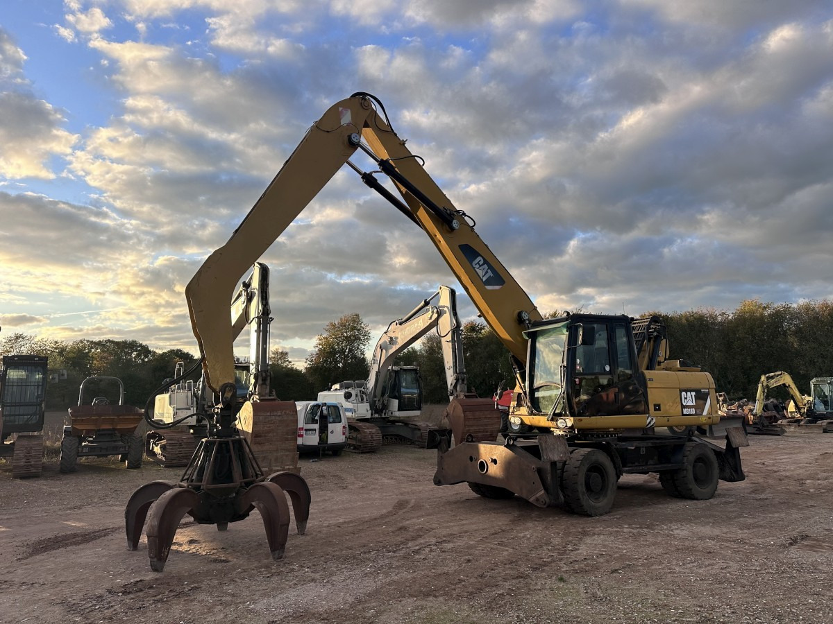 CATERPILLAR M 318 MH mit Greifer Kein 3022 3026 320 322 - Ratinis ekskavatorius: foto 1 CATERPILLAR M 318 MH mit Greifer Kein 3022 3026 320 322 - Ratinis ekskavatorius: foto 1