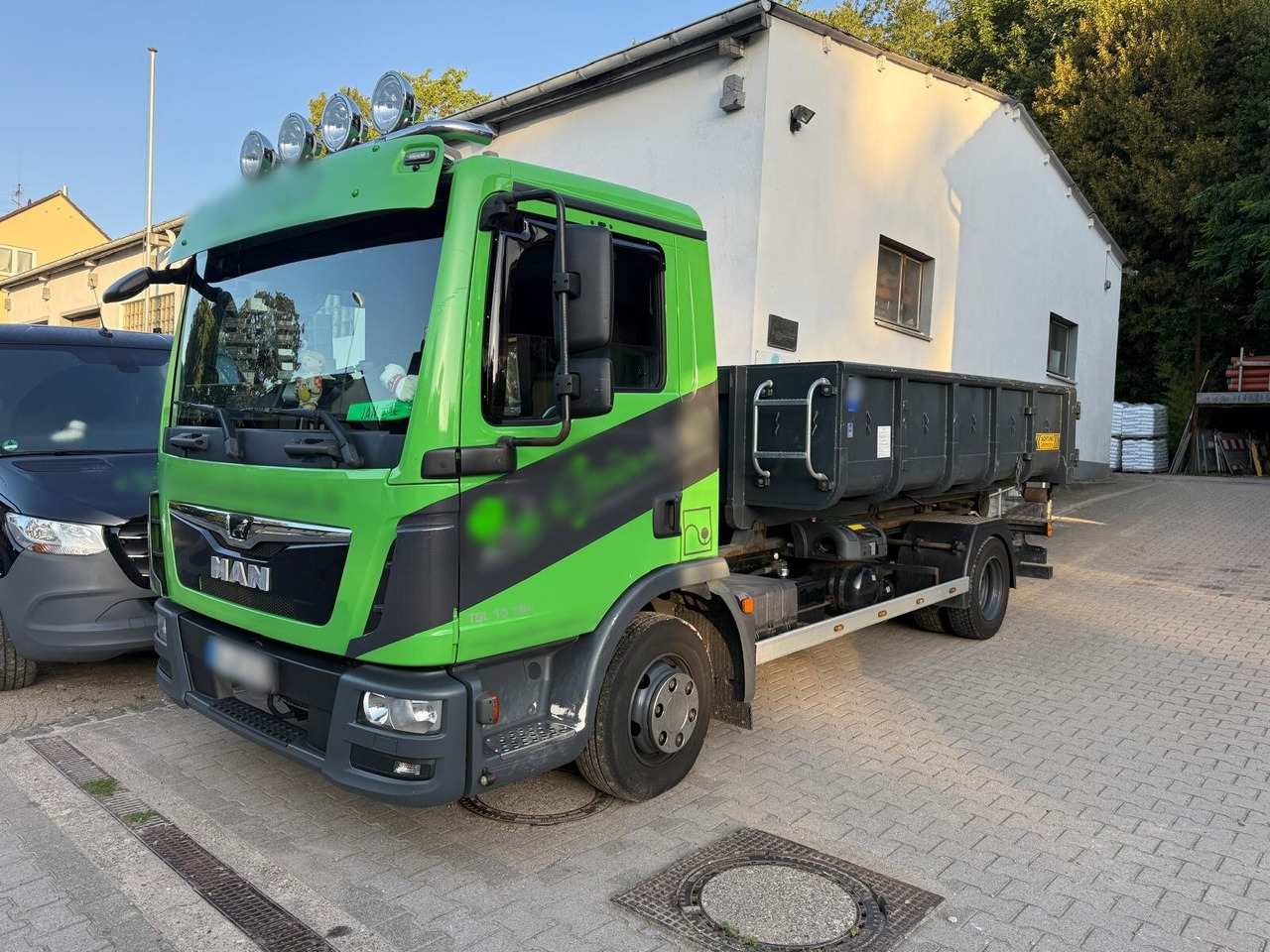 MAN TGL 10.180 4x2 BL TGL 10.180 4x2 BL City-Abrollkipper - Hook-lift sunkvežimis: foto 1 MAN TGL 10.180 4x2 BL TGL 10.180 4x2 BL City-Abrollkipper - Hook-lift sunkvežimis: foto 1