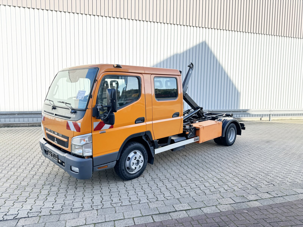 Mitsubishi Canter Fuso 6C15D 4x2 Doka Canter Fuso 6C15D 4x2 Doka, City-Abroller - Hook-lift sunkvežimis: foto 1 Mitsubishi Canter Fuso 6C15D 4x2 Doka Canter Fuso 6C15D 4x2 Doka, City-Abroller - Hook-lift sunkvežimis: foto 1