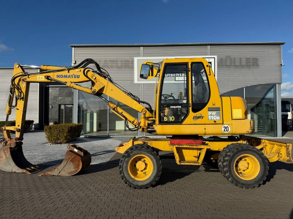 Komatsu PW 110 - Ratinis ekskavatorius: foto 1 Komatsu PW 110 - Ratinis ekskavatorius: foto 1