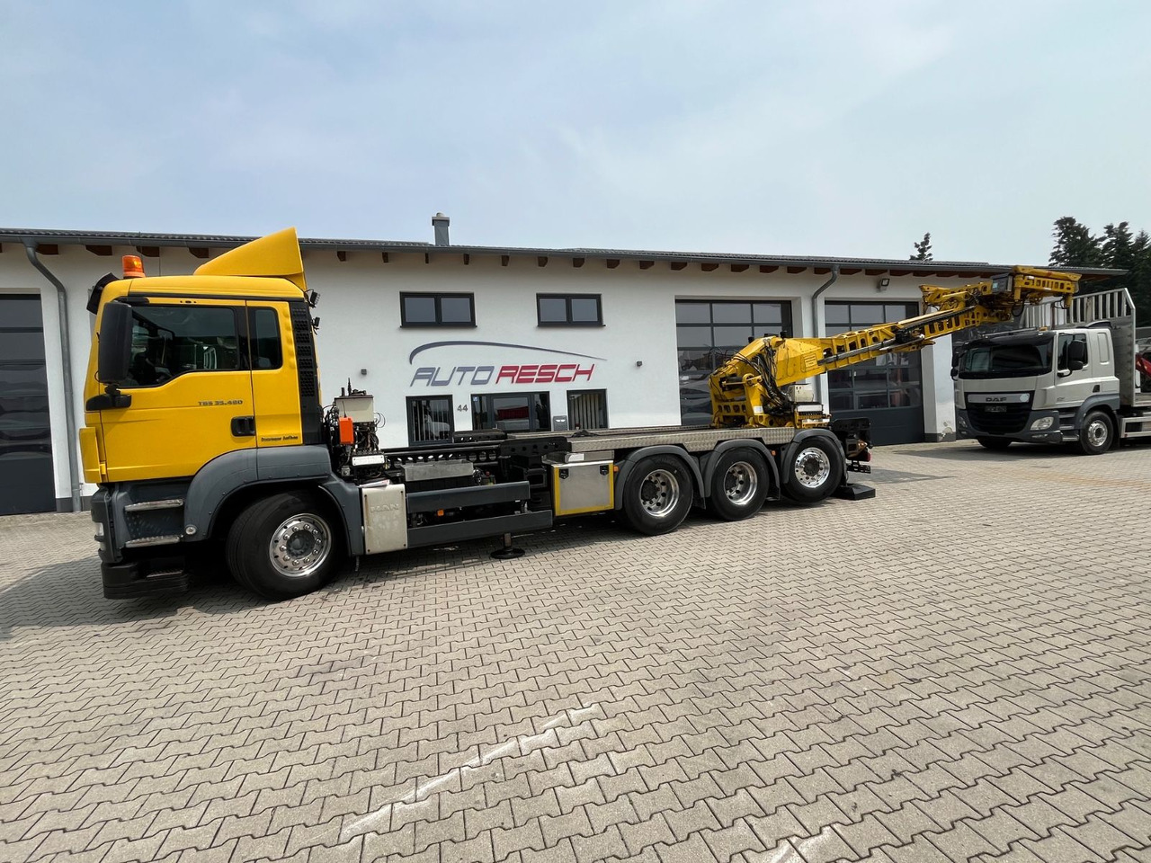 MAN TGS 35.480 8x4-4BL Deuringer Garagentransporter - Sunkvežimis su kranu: foto 4 MAN TGS 35.480 8x4-4BL Deuringer Garagentransporter - Sunkvežimis su kranu: foto 4