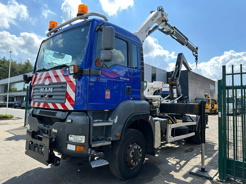 MAN TGA 18.310 4x4 HOOKLIFT + CRANE PALFINGER PK12000 - RADIO - ROTATOR - STEEL SPRING / HUB REDUCTION - MANUAL ZF - BE TRUCK - Hook-lift sunkvežimis, Sunkvežimis su kranu: foto 3 MAN TGA 18.310 4x4 HOOKLIFT + CRANE PALFINGER PK12000 - RADIO - ROTATOR - STEEL SPRING / HUB REDUCTION - MANUAL ZF - BE TRUCK - Hook-lift sunkvežimis, Sunkvežimis su kranu: foto 3