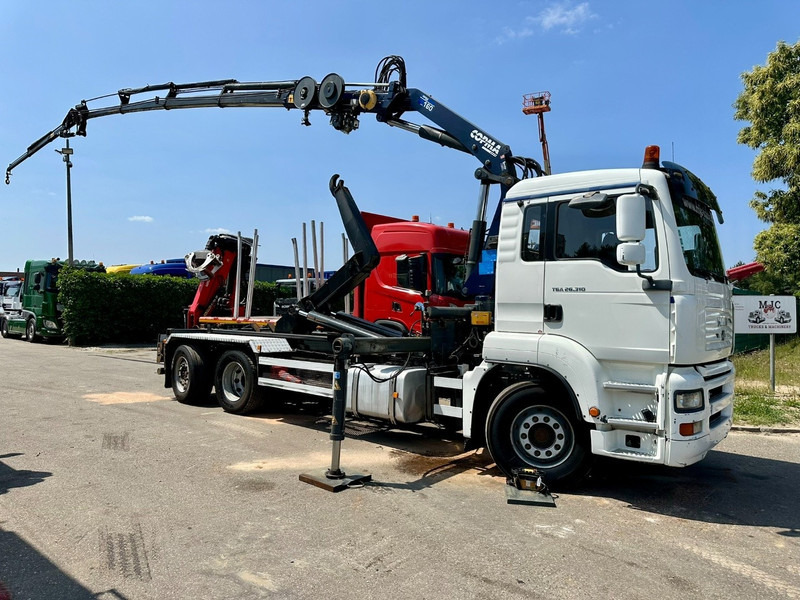 MAN TGA 26.310 6X2 HOOKLIFT + CRANE COPMA 160.4 + JIB J2 + WINCH - RADIO - LIFT + STEERING AXLE - EURO 3 - BE - Sunkvežimis su kranu: foto 1 MAN TGA 26.310 6X2 HOOKLIFT + CRANE COPMA 160.4 + JIB J2 + WINCH - RADIO - LIFT + STEERING AXLE - EURO 3 - BE - Sunkvežimis su kranu: foto 1