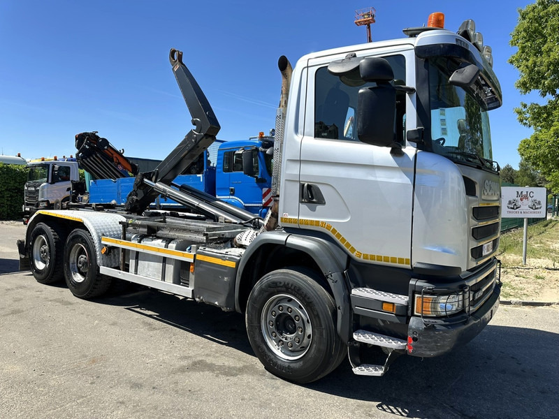 Scania G450 6x4 HOOKLIFT AJK 20T - 5760mm - 3m90 WB - HUB REDUCTION / STEEL SUSP. - EURO 6 - BE TRUCK - Hook-lift sunkvežimis: foto 1 Scania G450 6x4 HOOKLIFT AJK 20T - 5760mm - 3m90 WB - HUB REDUCTION / STEEL SUSP. - EURO 6 - BE TRUCK - Hook-lift sunkvežimis: foto 1