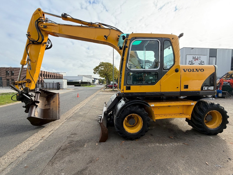 Volvo EW 140 B *FULL HYDR* - BLADE - 10.485h - TILT BUCKET - CE - NL MACHINE - GOOD CONDITION - Ratinis ekskavatorius: foto 5 Volvo EW 140 B *FULL HYDR* - BLADE - 10.485h - TILT BUCKET - CE - NL MACHINE - GOOD CONDITION - Ratinis ekskavatorius: foto 5