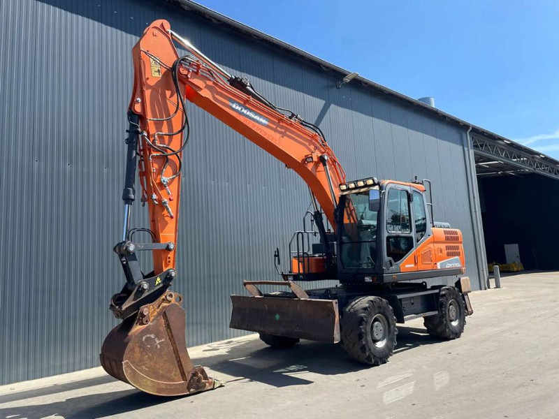 Doosan DX170W-5 - Ratinis ekskavatorius: foto 1 Doosan DX170W-5 - Ratinis ekskavatorius: foto 1