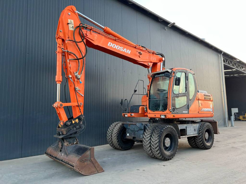 Doosan DX170W - Ratinis ekskavatorius: foto 1 Doosan DX170W - Ratinis ekskavatorius: foto 1