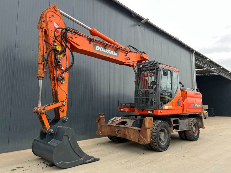 Doosan DX210W - Ratinis ekskavatorius: foto 1 Doosan DX210W - Ratinis ekskavatorius: foto 1