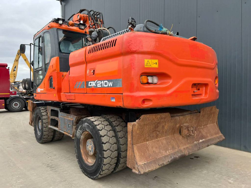 Doosan DX210W - Ratinis ekskavatorius: foto 2 Doosan DX210W - Ratinis ekskavatorius: foto 2
