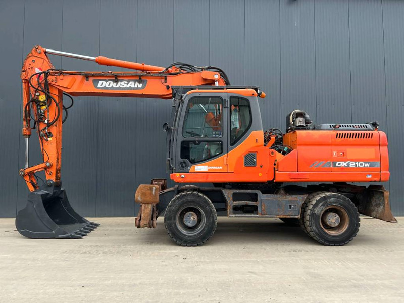 Doosan DX210W - Ratinis ekskavatorius: foto 5 Doosan DX210W - Ratinis ekskavatorius: foto 5