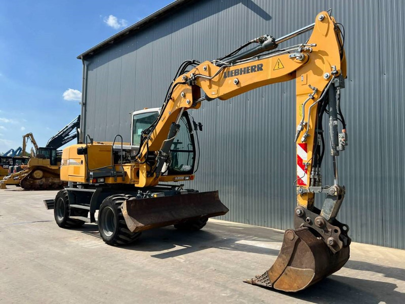 Liebherr A311 Litronic - Ratinis ekskavatorius: foto 3 Liebherr A311 Litronic - Ratinis ekskavatorius: foto 3