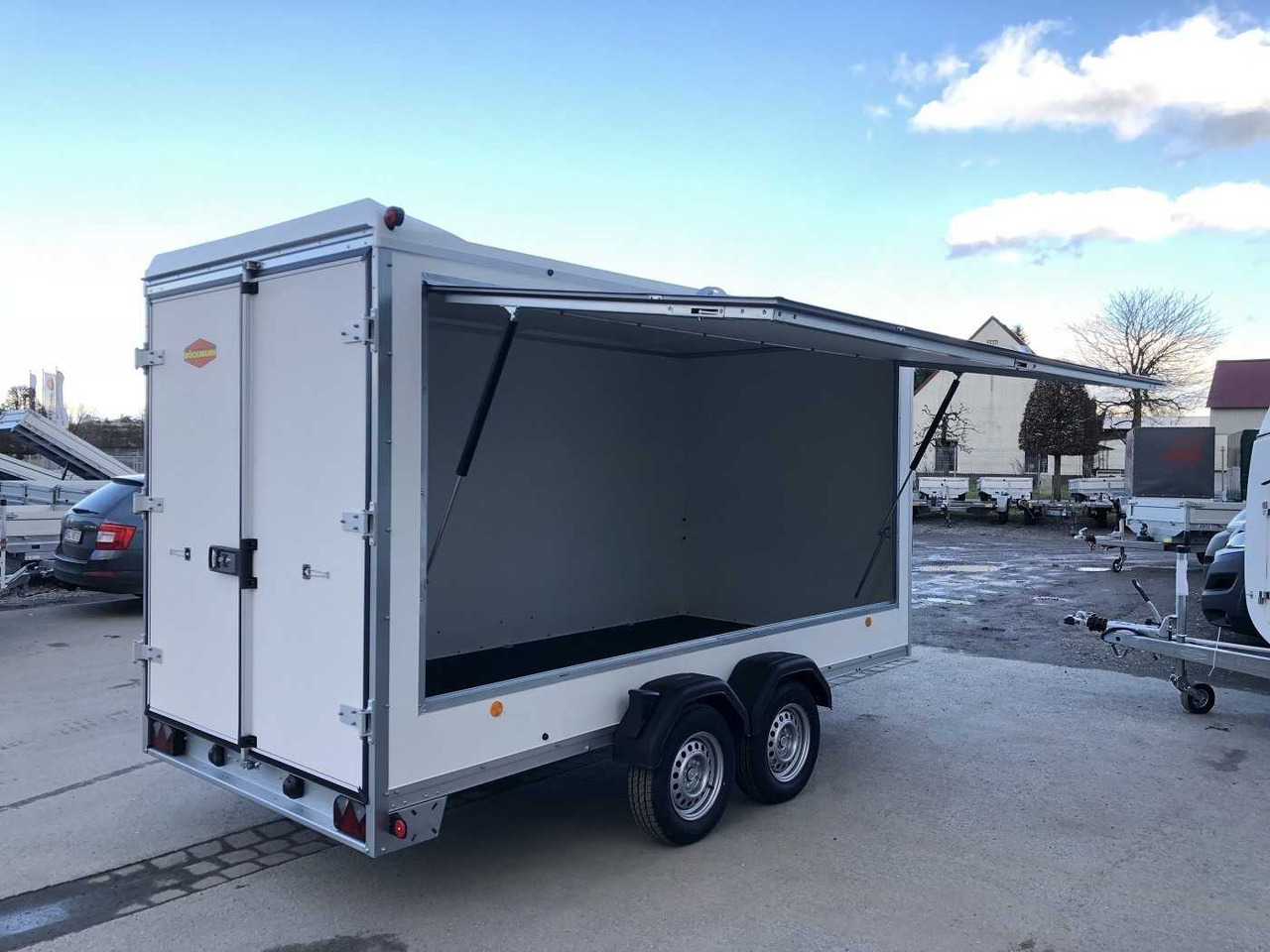 BOECKMANN KT 4018/27 H Aufstellklappe Kofferanhänger - Furgonas priekaba: foto 1 BOECKMANN KT 4018/27 H Aufstellklappe Kofferanhänger - Furgonas priekaba: foto 1