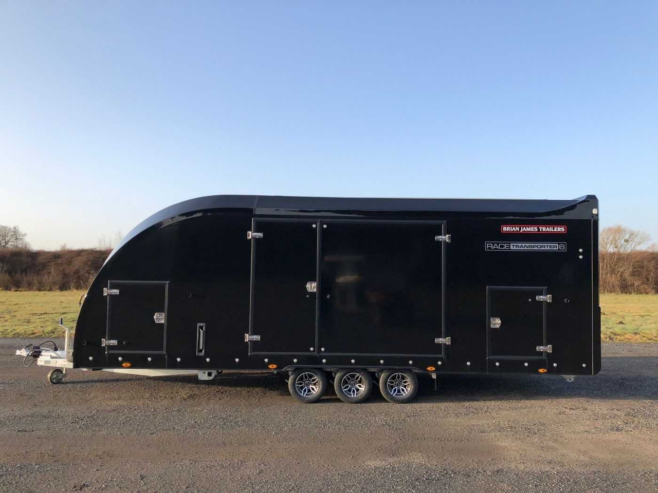 BRIAN_JAMES Race Transporter 6 3-Achser Autotransporter gesc - Autovežis priekaba: foto 1 BRIAN_JAMES Race Transporter 6 3-Achser Autotransporter gesc - Autovežis priekaba: foto 1