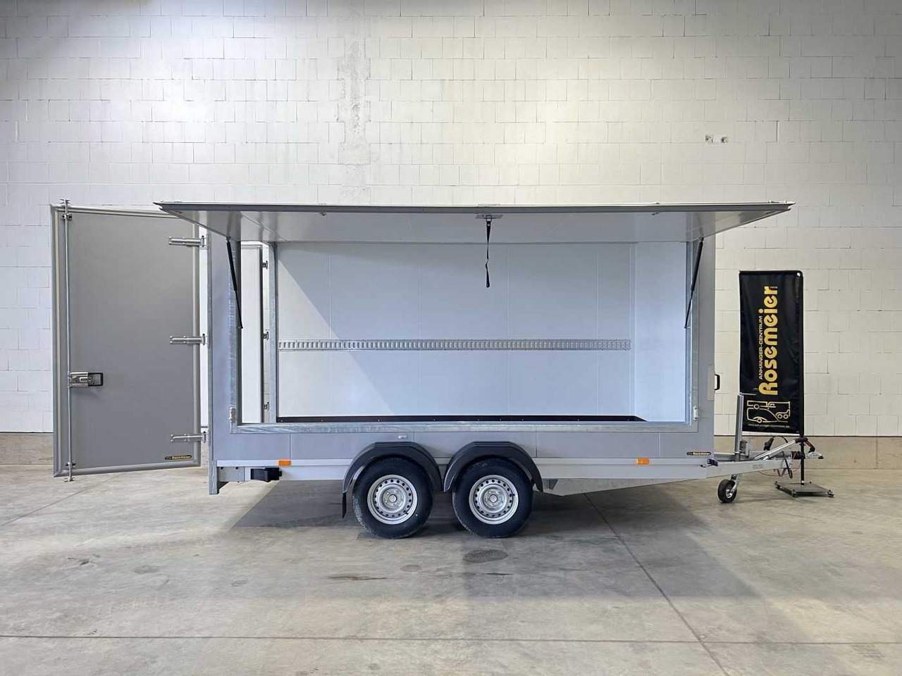 VEZEKO TK D 27.40 Flügeltüren+Seitenk Kofferanhänger Promotionanhänger - Furgonas priekaba: foto 1 VEZEKO TK D 27.40 Flügeltüren+Seitenk Kofferanhänger Promotionanhänger - Furgonas priekaba: foto 1