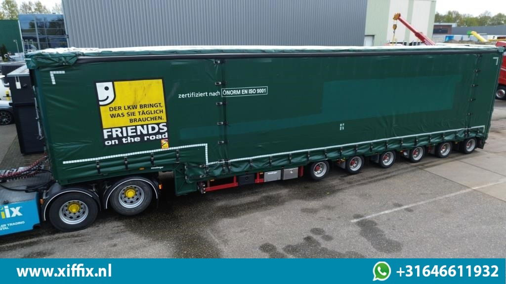 Meusburger 6-ass. Semi dieplader met elektrische huifopbouw / 3x naloop gestuurd - Žemo profilio platforma puspriekabė: foto 1 Meusburger 6-ass. Semi dieplader met elektrische huifopbouw / 3x naloop gestuurd - Žemo profilio platforma puspriekabė: foto 1