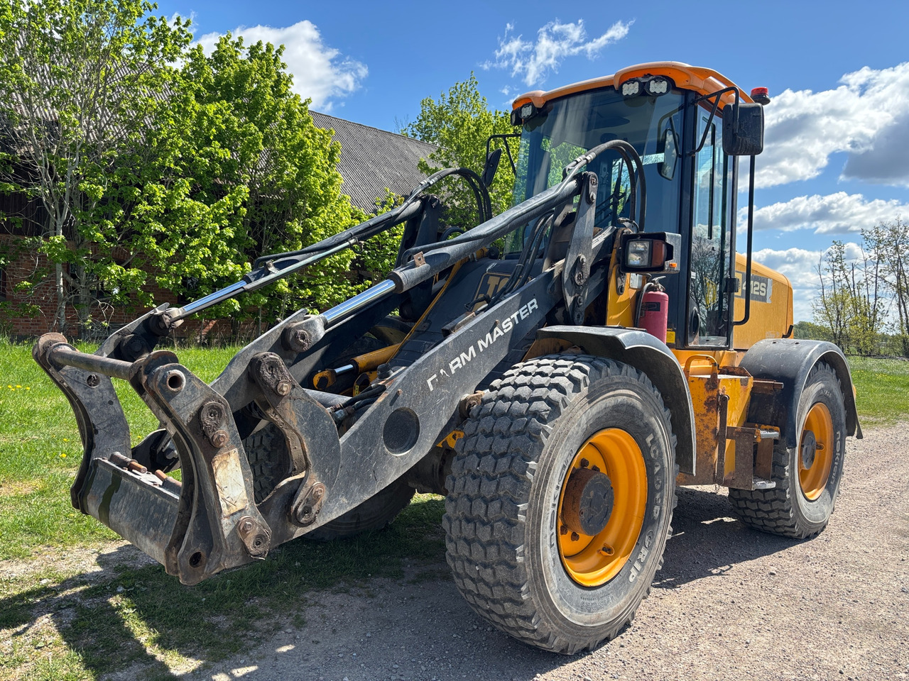 JCB 412 S - Ratinis krautuvas: foto 1 JCB 412 S - Ratinis krautuvas: foto 1