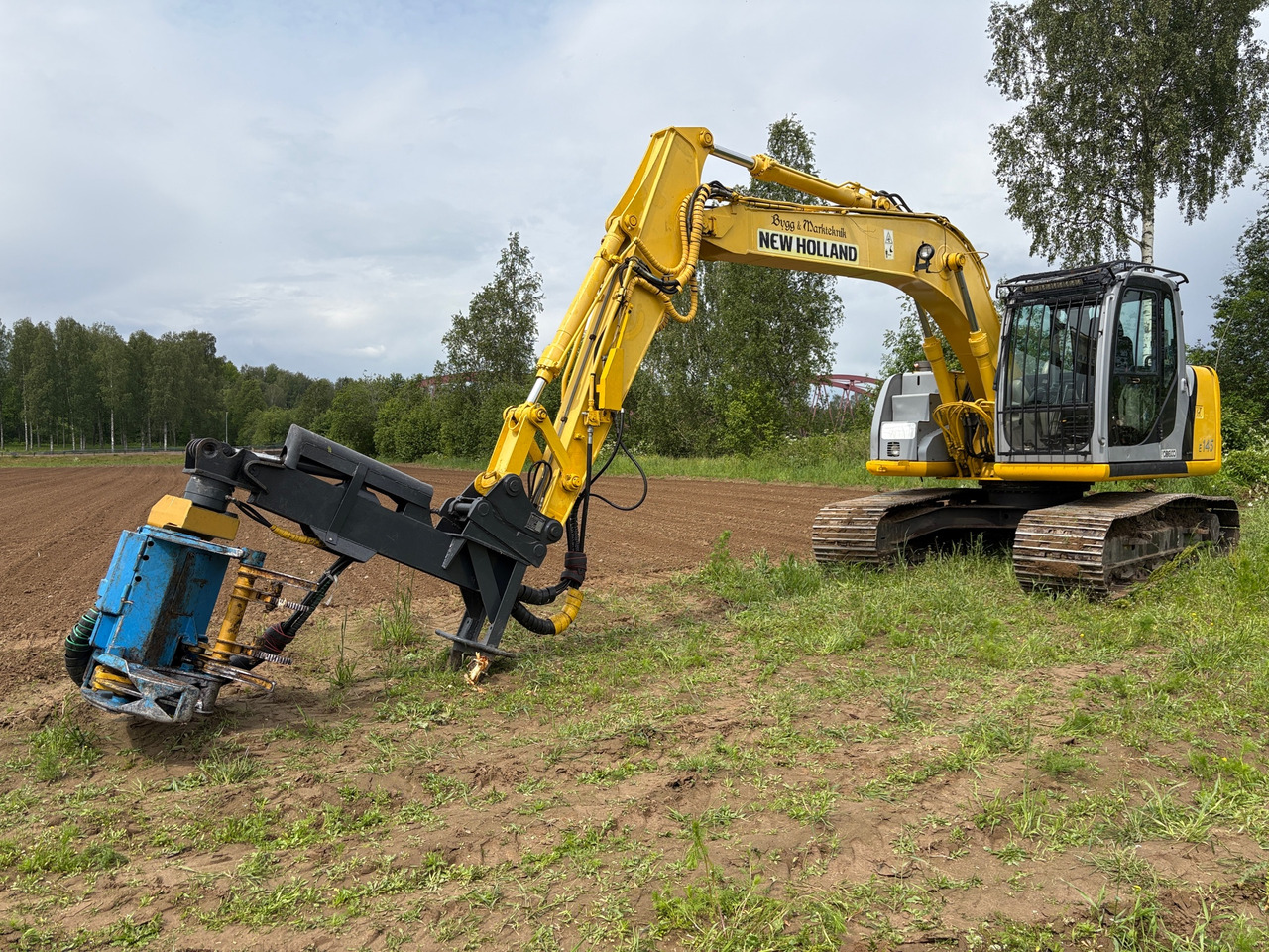 New Holland E 145 - Ekskavatorius: foto 1 New Holland E 145 - Ekskavatorius: foto 1