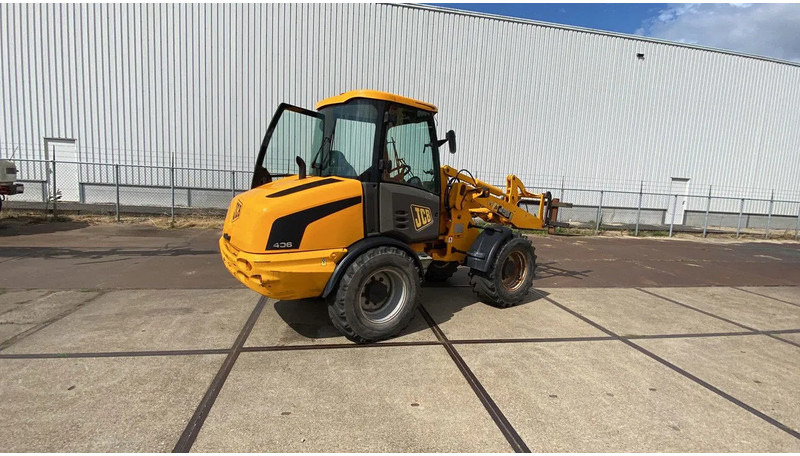 JCB KNIKSCHOVEL 406 - Ratinis krautuvas: foto 4 JCB KNIKSCHOVEL 406 - Ratinis krautuvas: foto 4