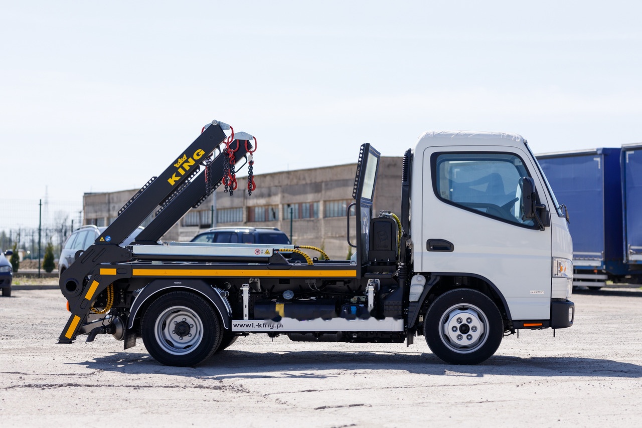 MITSUBISHI Fuso Canter 9C18 - Nuožulnaus pakėlimo ant platformos sunkvežimis: foto 2 MITSUBISHI Fuso Canter 9C18 - Nuožulnaus pakėlimo ant platformos sunkvežimis: foto 2